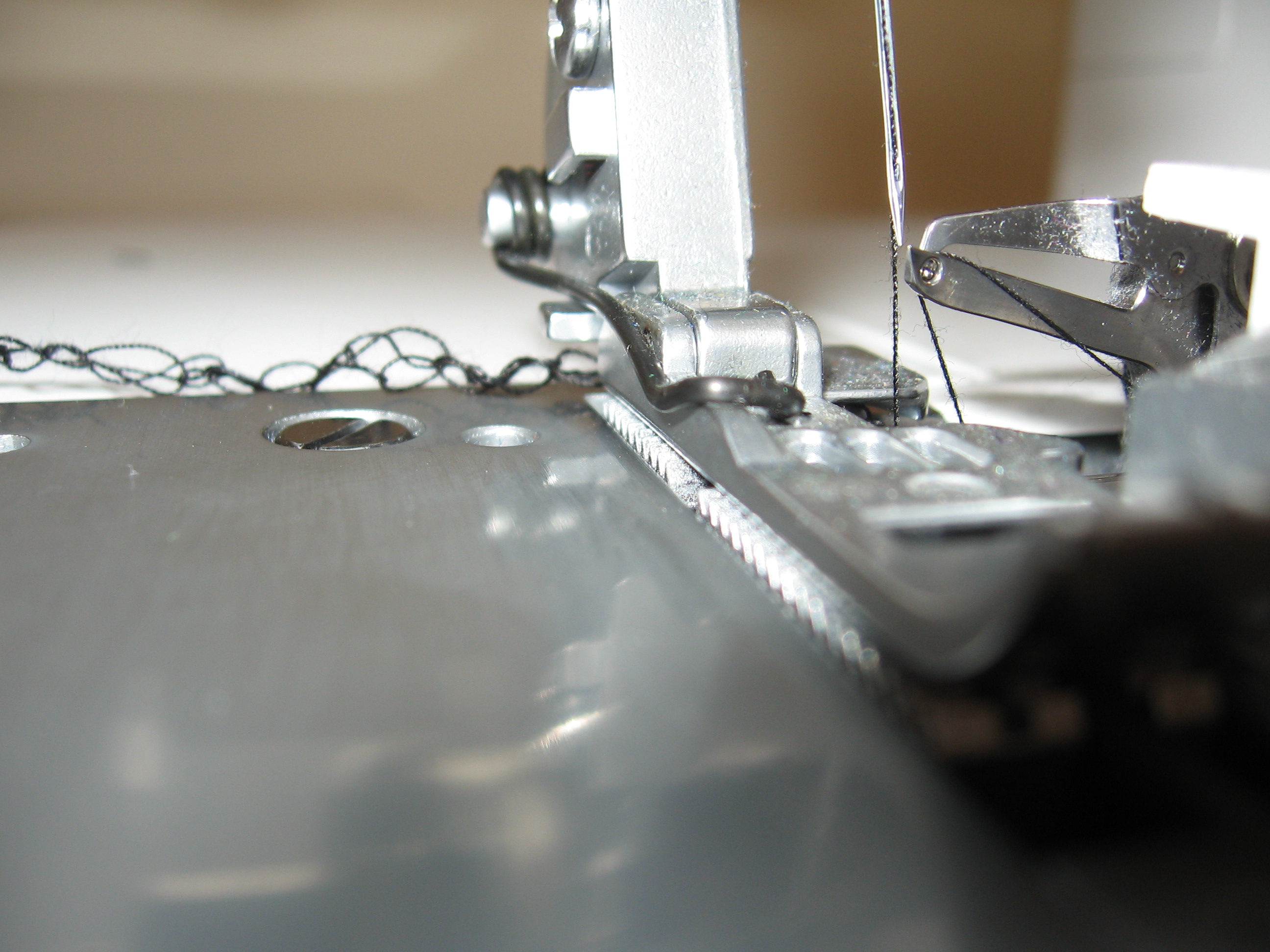 Naaimachine presservoet close-up